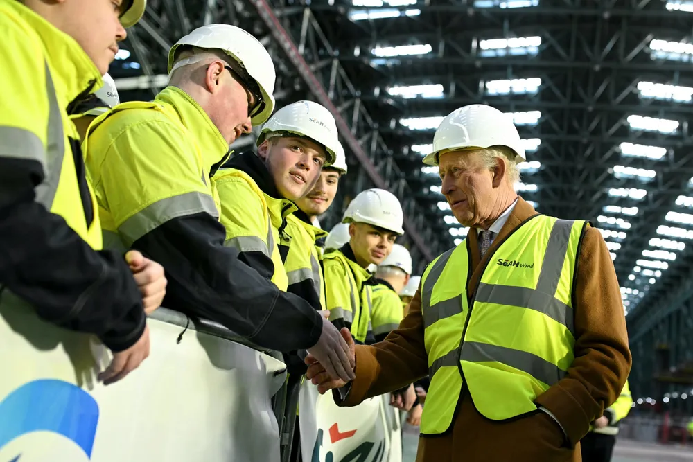 King Charles III meets staff during a visit to at SeAH Wind's factory. Today the plant will be hit by a walkout over pay.