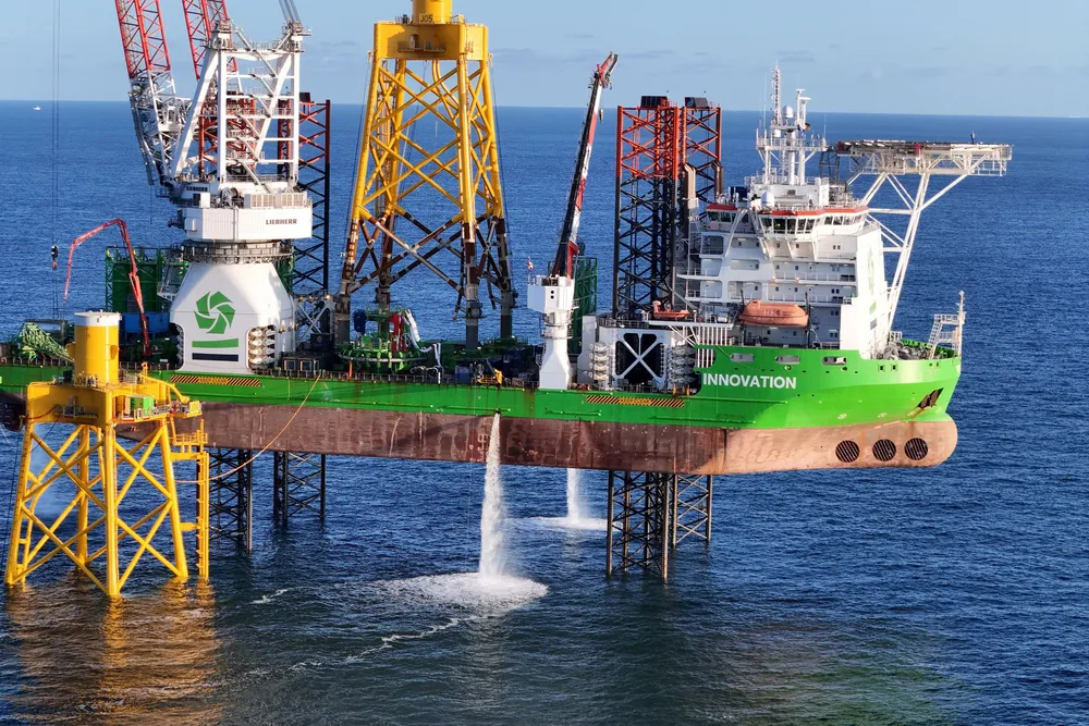 DEME’s Innovation heavy lift jack-up vessel installing the first jacket foundation on the 496MW Dieppe-Le Treport (EMDT) offshore wind farm in northern France