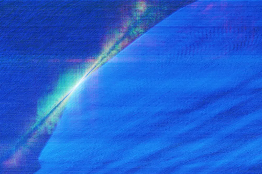 A hyperspectral - raw data produced by a new system that can turn subsea power cables into sensors capable of both monitoring their own health and that of the offshore wind turbines they service. This image shows a ship crossing the cable, with its wake spreading out in blue, the engine noise in red and propeller noise in green.