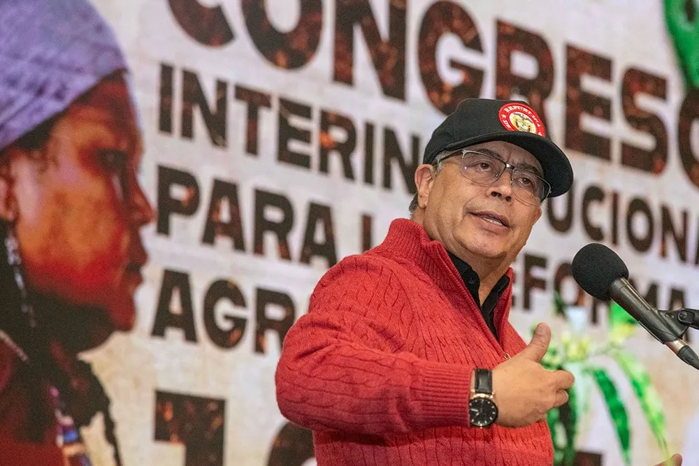 President Gustavo Petro, seen here addressing a forum on agrarian reform, has vowed to end Colombia's dependence on fossil fuels.